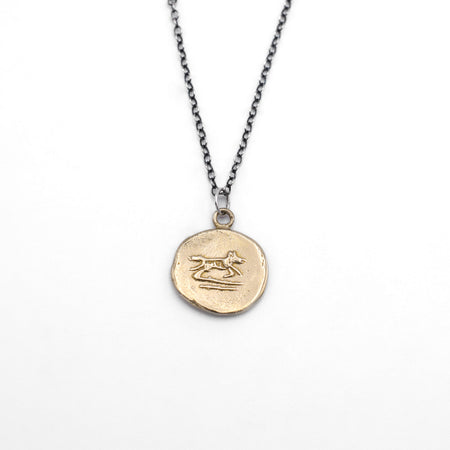 Dog talisman necklace - brass on silver