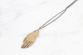 Hand amulet necklace - brass on silver