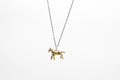 Tiny horse necklace - brass on silver