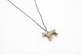 Tiny horse necklace - brass on silver