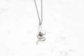 Hand & Snake necklace - silver