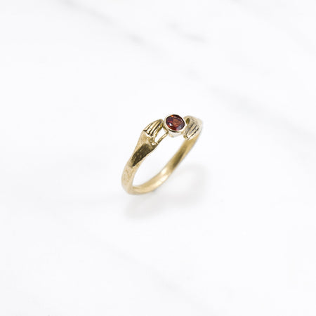 Offering ring - gold with garnet