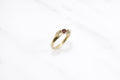 Offering ring - gold with garnet