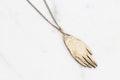 Hand amulet necklace - brass on silver